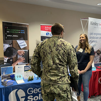 In this picture, Geographic Solutions’ booth is flanked by a truss system and several monitors at the 2017 Forum, a conference by the National Association of Workforce Boards.